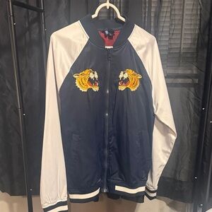 Divided Navy Bomber Jacket with Cream Sleeves and Tiger Motif
